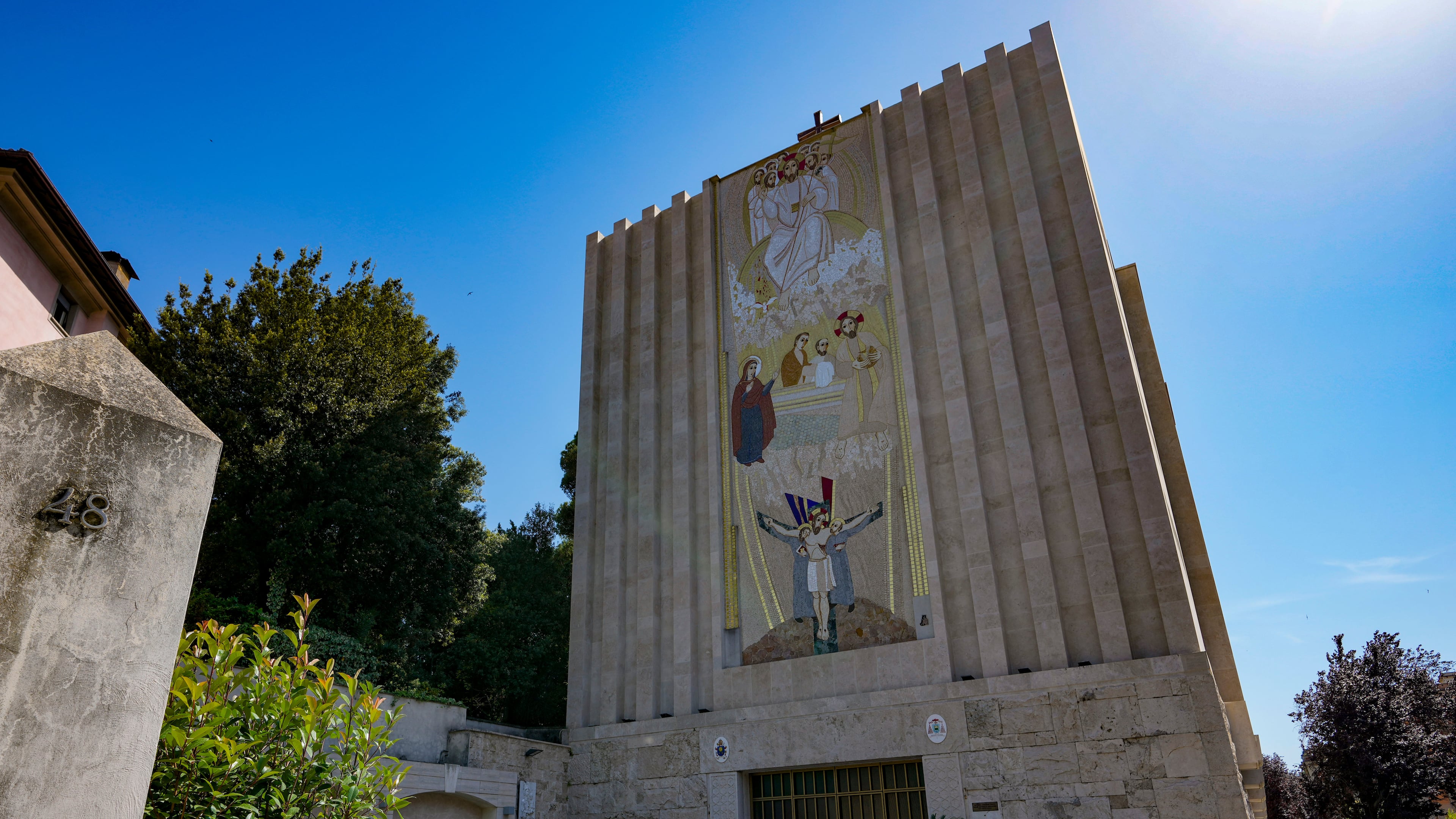 FILE - A mosaic by ex-Jesuit artist Marko Rupnik is seen on the main facade of the Church of Our Lady of the Canadian Martyrs, June 28, 2024, in Rome. (AP Photo/Andrew Medichini, File)