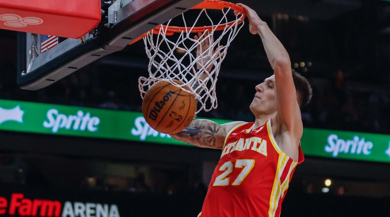 Atlanta Hawks guard Vit Krejci (27) dunks the ball during the first half at State Farm Arena on Monday, October 28, 2024, in Atlanta.
(Miguel Martinez/ AJC)