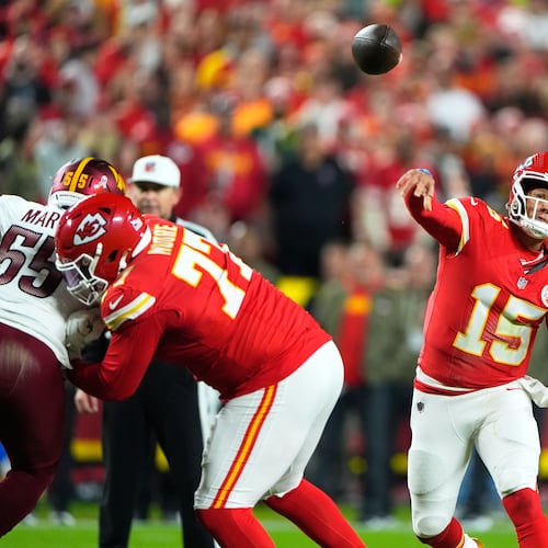 Kansas City Chiefs quarterback Patrick Mahomes (15) throws during the first half of an NFL football game against the Washington Commanders Monday, Oct. 27, 2025, in Kansas City, Mo. (AP Photo/Charlie Riedel)