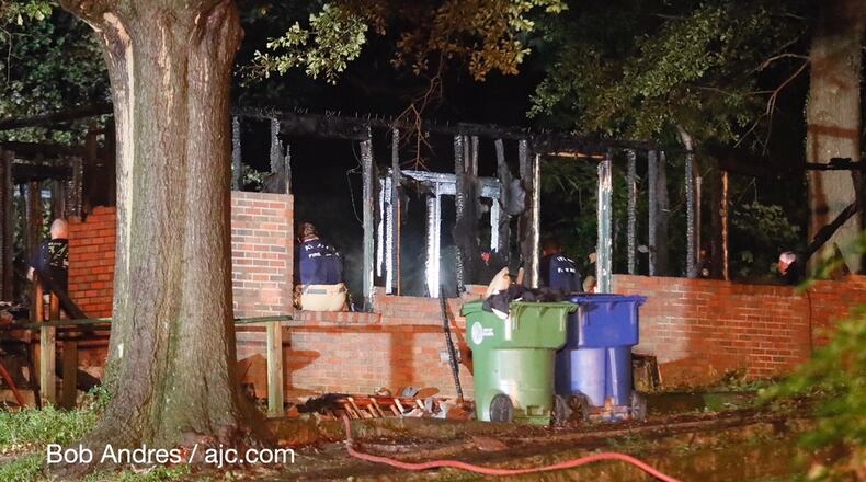 Atlanta fire crews work an early Friday morning fatal house fire on Pegg Road in southwest Atlanta.
