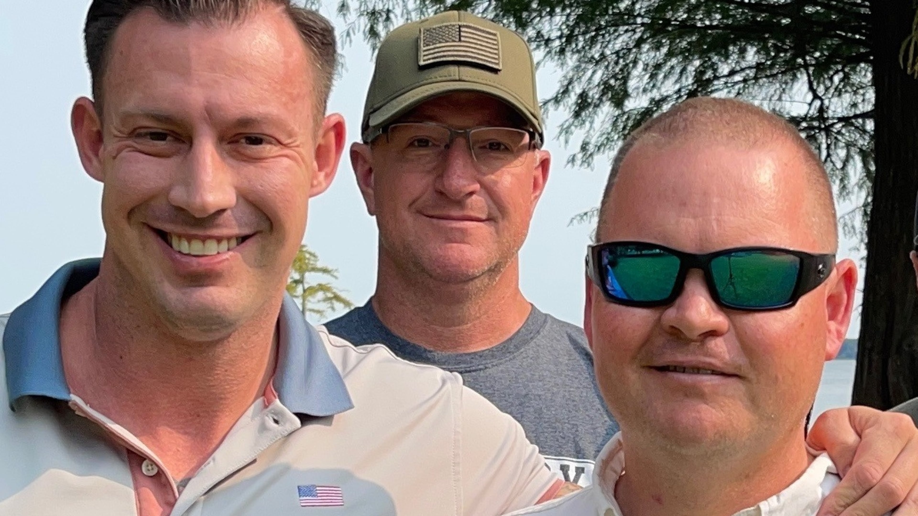 Johnny Joey Jones (left) included interviews with his friend Clay Headrick (middle) and brother-in-law Keith Dempsey in his book, "Behind the Badge: Answering the Call to Serve on America's Homefront." (Courtesy of Keith Dempsey)