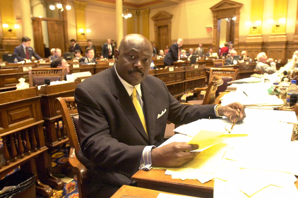 Charles Walker Sr., seen here as he sits at his desk in the state Senate in 2002. (W. A. Bridges Jr./AJC)