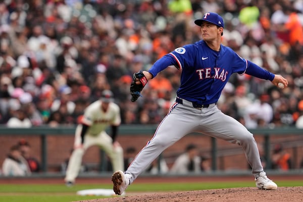 Texas Rangers pitcher Jacob Latz throws to a San Francisco Giants batter during the fourth inning of a baseball game Sunday, April 27, 2025, in San Francisco. (AP Photo/Godofredo A. Vásquez)