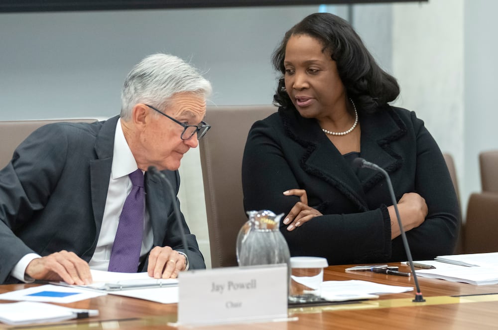 Federal Reserve Chair Jerome Powell shared an exchange with board member Lisa Cook before a meeting in Washington in June.