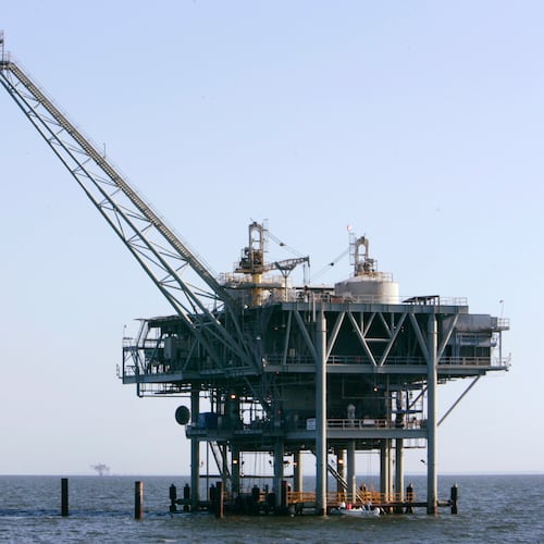 FILE - A natural gas platform is shown, April 13, 2006, off the coast of Fort Morgan, Ala. (AP Photo/Rob Carr, File)