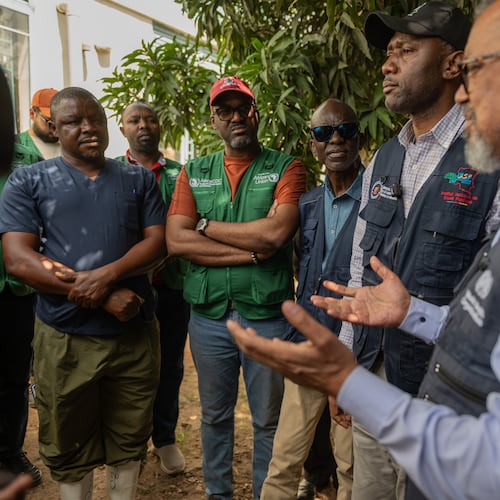 Director General of the World Health Organisation (WHO), Tedros Adhanom Ghebreyesus, meets with health workers who recovered from Ebola in Bunia, Congo, Sunday, May 31, 2026. (AP Photo/Moses Sawasawa)