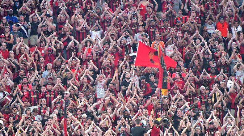 September 16, 2017 Atlanta - Atlanta United fans cheer in the first half of an MLS soccer match at the Mercedes-Benz Stadium on Saturday, September 16, 2017. HYOSUB SHIN / HSHIN@AJC.COM