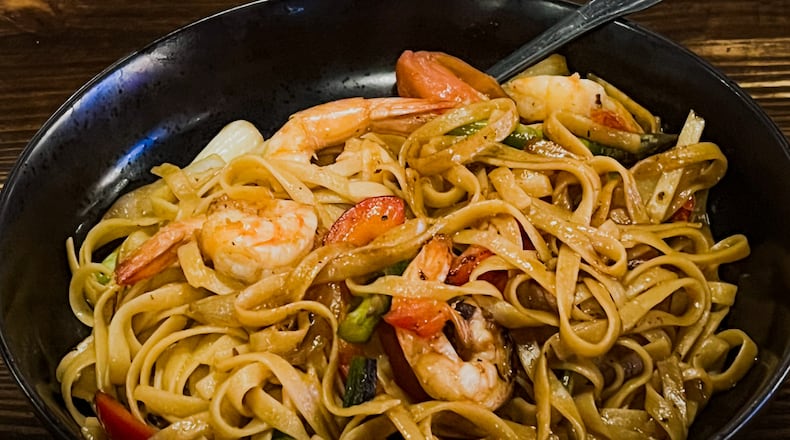 Chinese immigrants had an impact on Peruvian cuisine, and lo mein is one of the wok dishes available at Pisco Latin Kitchen. Henri Hollis/henri.hollis@ajc.com