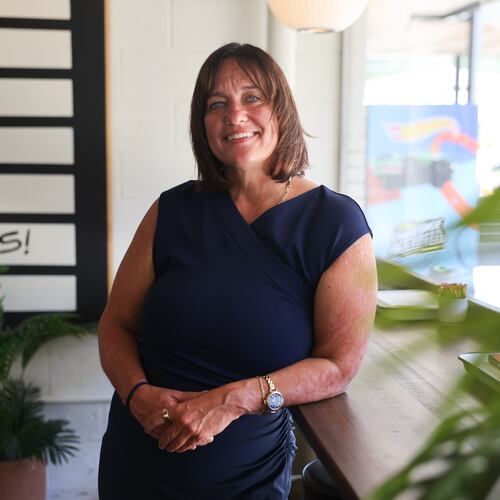 Kristine Sickels stands inside the Switchyards Toco Hills co-working space on Monday, Sept. 14, 2026. The author and marketing executive moved to Atlanta nearly 20 years ago. (Arvin Temkar/AJC)