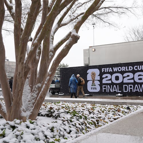 People arrive for the draw for the 2026 soccer World Cup at the Kennedy Center in Washington, Friday, Dec. 5, 2025. (AP Photo/Stephanie Scarbrough)
