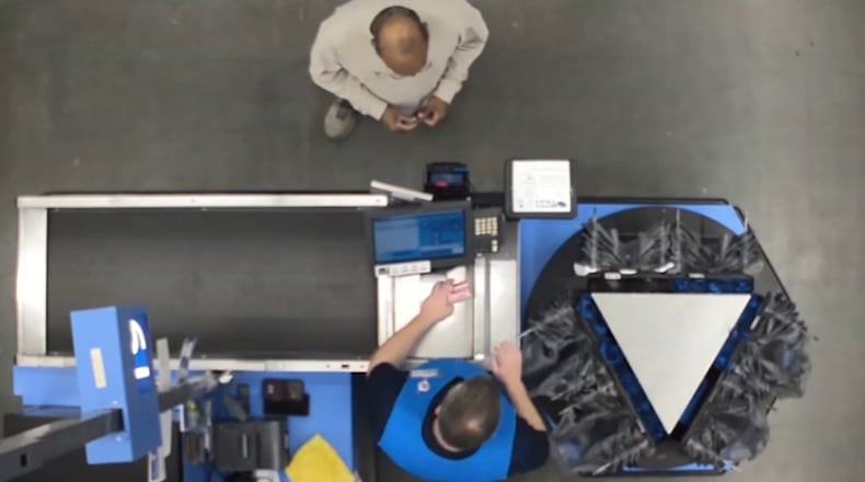 Surveillance footage from the Acworth Walmart shows 56-year-old Mahendra Patel using his bank card to purchase a bottle of Tylenol.  A fellow shopper accused the real estate investor of trying to abduct her 2-year-old.