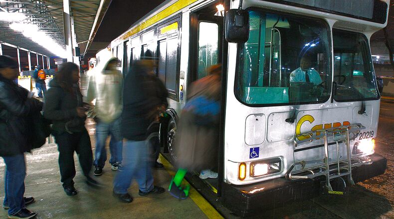 C-Tran buses load up at Hartsfield-Jackson International Airport Wednesday, March 10, 2010 where riders will be transported back to various destinations in Clayton County.