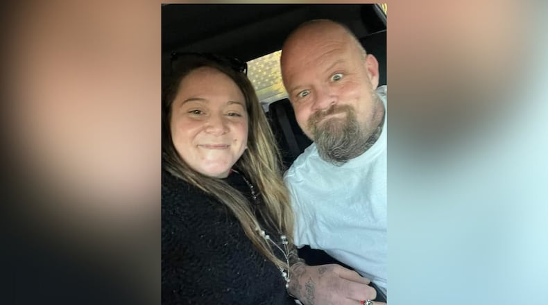 Kristin Brock (left) and James Brock were shot and killed in their bedroom at their Carrollton area home Thursday.