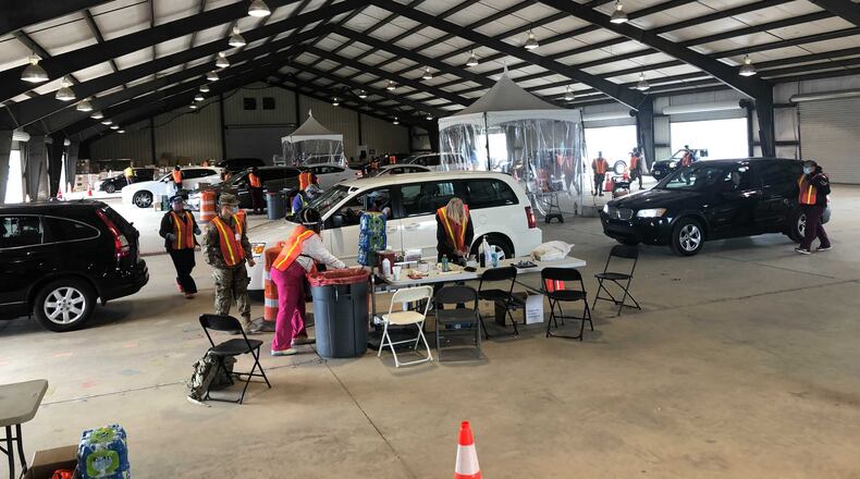 Georgia plans to close mass vaccination sites such as this one at Habersham County Fairgrounds in Clarkesville by May 21 due to a decline in demand. Helena Oliviero / Helena.Oliviero@ajc.com