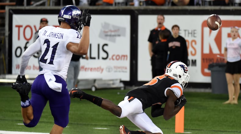 CORVALLIS, OR - SEPTEMBER 04: Wide receiver Victor Bolden #6 of the Oregon State Beavers can't hold onto a pass as cornerback Taron Johnson #21 of the Weber State Wildcats defends during the fourth quarter of the game at Reser Stadium on September 4, 2015 in Corvallis, Oregon. (Photo by Steve Dykes/Getty Images)