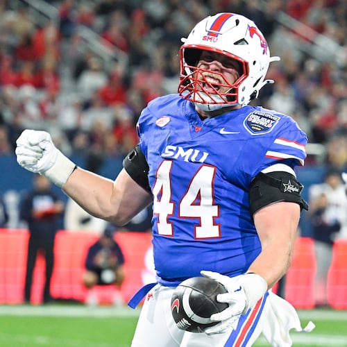 SMU tight end Stone Eby (44) celebrates after scoring a touchdown during the first half of the Holiday Bowl NCAA college football game against Arizona Friday, Jan. 2, 2026, in San Diego. (AP Photo/Denis Poroy)
