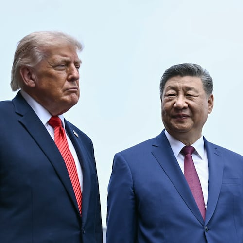 FILE - China's President Xi Jinping, right, and U.S. President Donald Trump visit the Temple of Heaven in Beijing, May 14, 2026. (Brendan Smialowski/Pool Photo via AP, File)