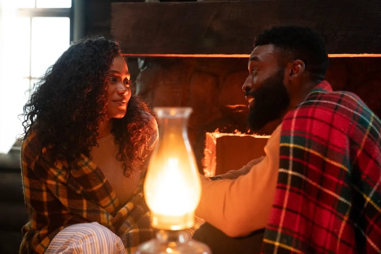 Shannon Thornton and Tosin Morohunfola find love while stuck in a snowstorm in "Tyler Perry's Finding Joy." (Courtesy of Amazon)