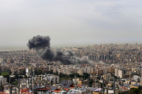 Smoke rises following an Israeli airstrike on Dahiyeh, in the southern suburb of Beirut, Lebanon, Friday, March 28, 2025. (AP Photo/Hassan Ammar)
