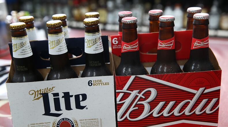 Bottles of Budweiser and Miller Lite beer
