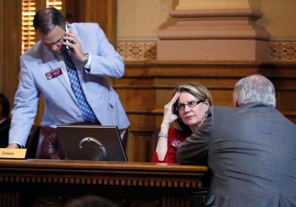 House Speaker Pro Tem Jan Jones waits for a late afternoon Rules Committee meeting to begin. It's the panel that decides what legislation will get a floor vote. BOB ANDRES  /BANDRES@AJC.COM
