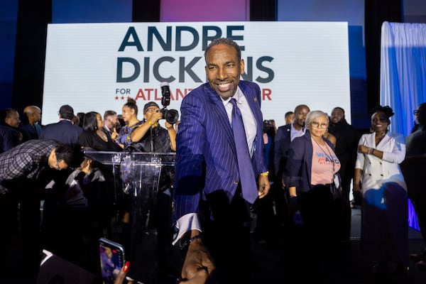 Mayor Andre Dickens is a happy man after being elected to a second term on Tuesday. (Arvin Temkar/AJC)