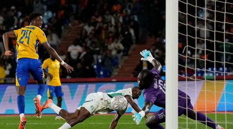 Ivory Coast's Bazoumana Touré scores during the Africa Cup of Nations group F soccer match between Gabon and Ivory Coast, in Marrakech, Morocco, Wednesday, Dec. 31, 2025. (AP Photo/Themba Hadebe)