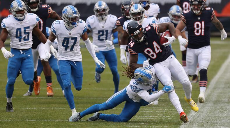 Chicago Bears wide receiver Cordarrelle Patterson (84) is tackled by Detroit Lions cornerback Mike Ford (38) after a 45-yard kickoff return to open the first quarter Sunday, Dec. 6, 2020 at Soldier Field in Chicago. (Brian Cassella/Chicago Tribune/TNS)