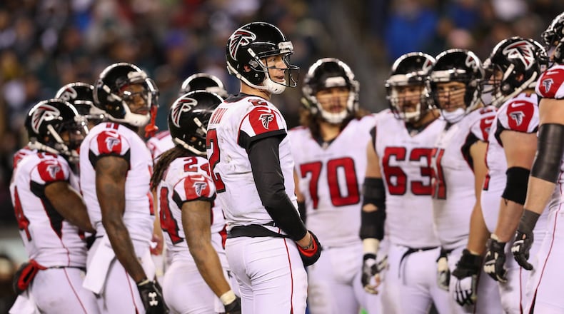 Falcons quarterback Matt Ryan huddles teammates during the NFC Divisional Playoff game at Philadelphia's Lincoln Financial Field Jan. 13, 2018.