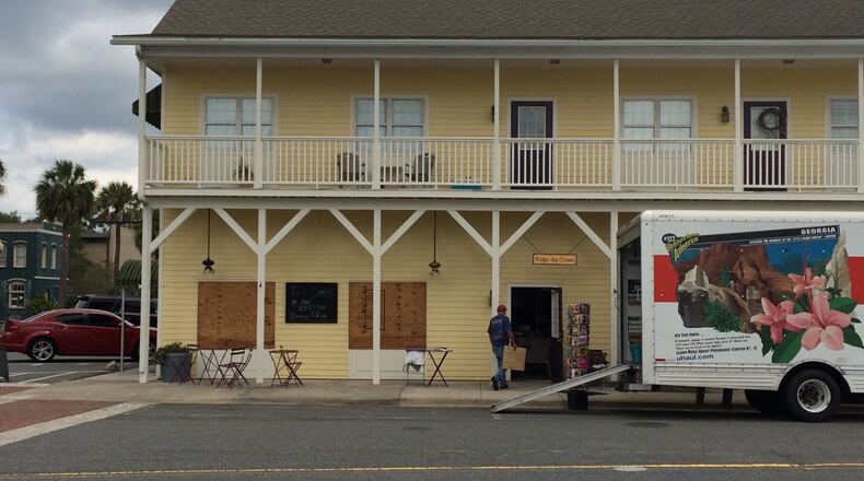 At Market on the Square in St. Marys, workers loaded up perishables and equipment Friday to drive it to safer land, in hopes of avoiding flooding trouble ahead of Hurricane Irma. Last year, Hurricane Matthew caused the St. Marys River, which cuts the Georgia-Florida border near the Atlantic,  flooded the shop.
