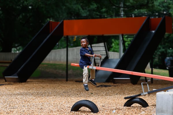 Ezekqual Jeanpierre, 3, plays at the Noguchi Playscape at Piedmont Park in Atlanta on May 22, 2026. (Arvin Temkar/AJC)
