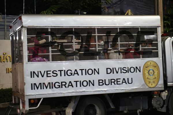 FILE - This photo provided by Thailand's daily web newspaper Prachatai shows a vehicle with a load of unidentified passengers in Bangkok, Thailand, on Feb. 27, 2025. (Nuttaphol Meksobhon/Prachatai via AP, File)