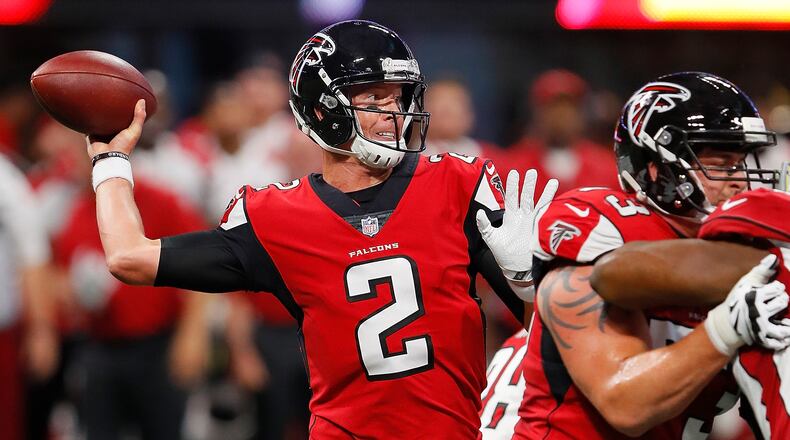 Falcons quarterback Matt Ryan looks to pass against the Arizona Cardinals at Mercedes-Benz Stadium Saturday, Aug. 26, 2017, in Atlanta.