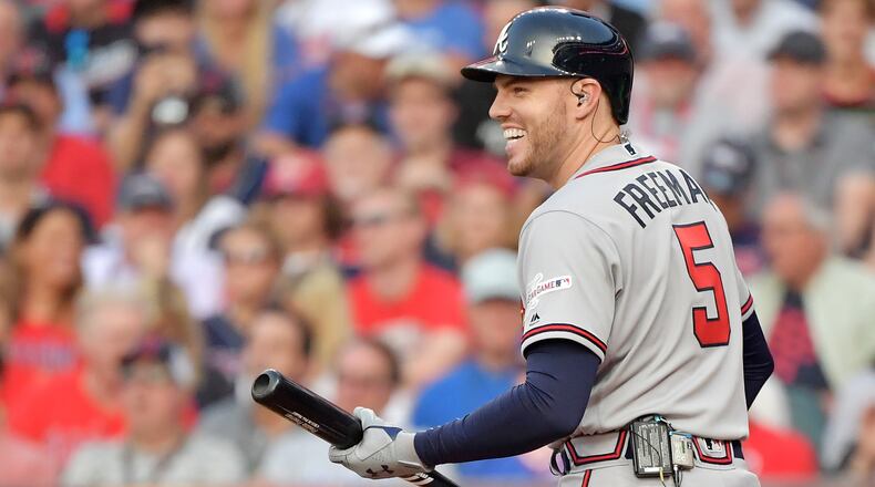 Braves first baseman Freddie Freeman walks away from the plate laughing after striking out in his first at-bat at he 2019 All-Star Game July 9, 2019, in Cleveland.