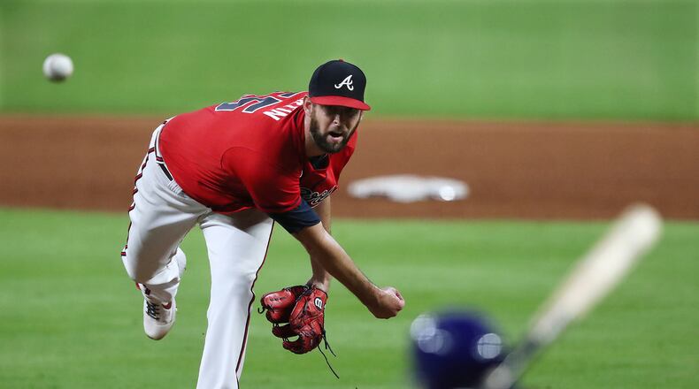 Braves reliever Chris Martin fires a pitch. Curtis Compton / AJC