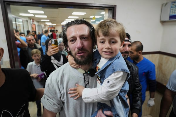 Freed Palestinian prisoner Mohammad Al-Sharif, who was detain by the Israeli army during its ground operation in the Gaza Strip, arrives at al-Aqsa Hospital in Deir al-Balah, central Gaza, after his release from an Israeli prison, Tuesday, April 29, 2025. (AP Photo/Abdel Kareem Hana)