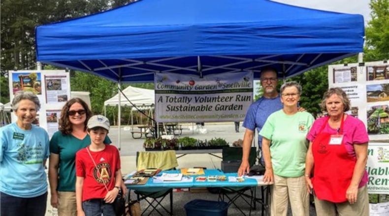 From left are Martha Whitman, Susan Langley and her son South, Wes Nettleton, Lucy Nettleton and Sharon Noy, all members of the Community Garden @ Snellville. (Courtesy City of Snellville)
