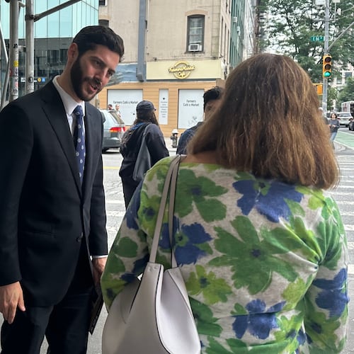 New York Assemblymember Alex Bores campaigns for the Democratic nomination for Congress in New York City on Monday, June 22, 2026. (AP Photo/Anthony Izaguirre)