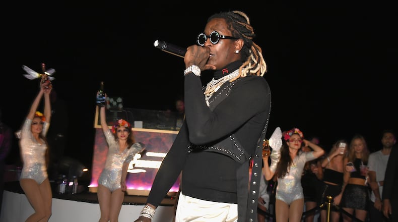 Rapper Young Thug performs in 2018 in Miami Beach, Florida. His 21-year-old nephew, Farderren Deonta Grier, has been charged with murder. (Andrew Toth/Getty Images/TNS)