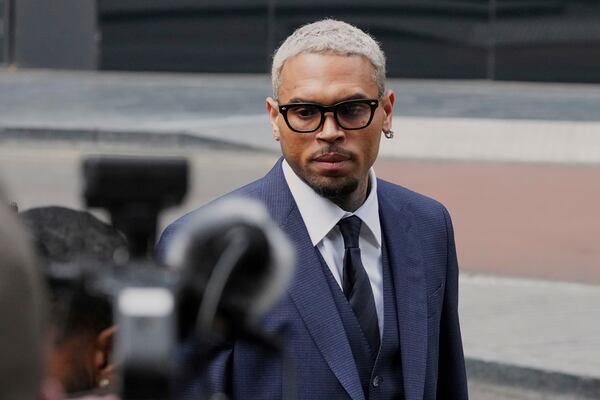 R&B singer Chris Brown arrives at Southwark Crown Court to attend a plea hearing in London, Friday, June 20, 2025. (AP Photo/Frank Augstein)