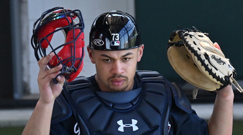 Atlanta Braves catcher Drake Baldwin watches his teammates during Braves spring training at CoolToday Park, Saturday, Feb. 18, 2023, in North Port, Fla.. (Hyosub Shin / Hyosub.Shin@ajc.com)