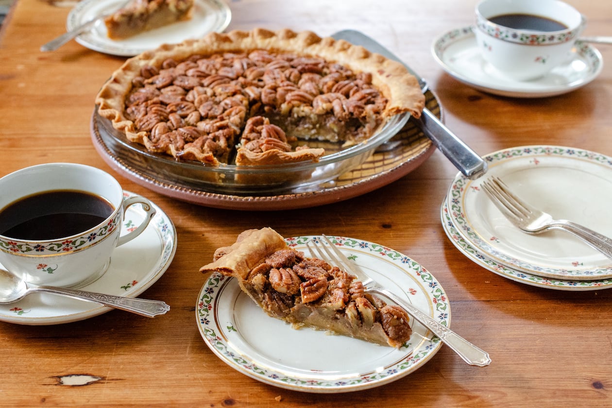 Buttermilk Pecan Pie showcases the rich flavor of freshly harvested pecans in a not-too-sweet custard. (Virginia Willis for the AJC)