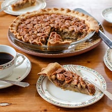 Buttermilk Pecan Pie showcases the rich flavor of freshly harvested pecans in a not-too-sweet custard. (Virginia Willis for the AJC)