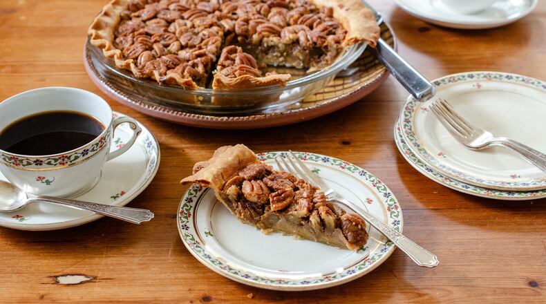 Buttermilk Pecan Pie showcases the rich flavor of freshly harvested pecans in a not-too-sweet custard. (Virginia Willis for the AJC)