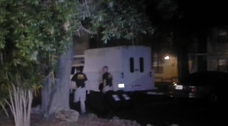 The FBI arrives at Omar Mateen’s home in Fort Pierce late Sunday to search the premises. (Julius Whigham II / staff photo)
