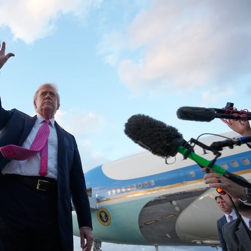 President Donald Trump waves after arriving on Air Force One, Friday, Oct. 17, 2025, at Palm Beach International Airport in West Palm Beach, Fla. (AP Photo/Mark Schiefelbein)