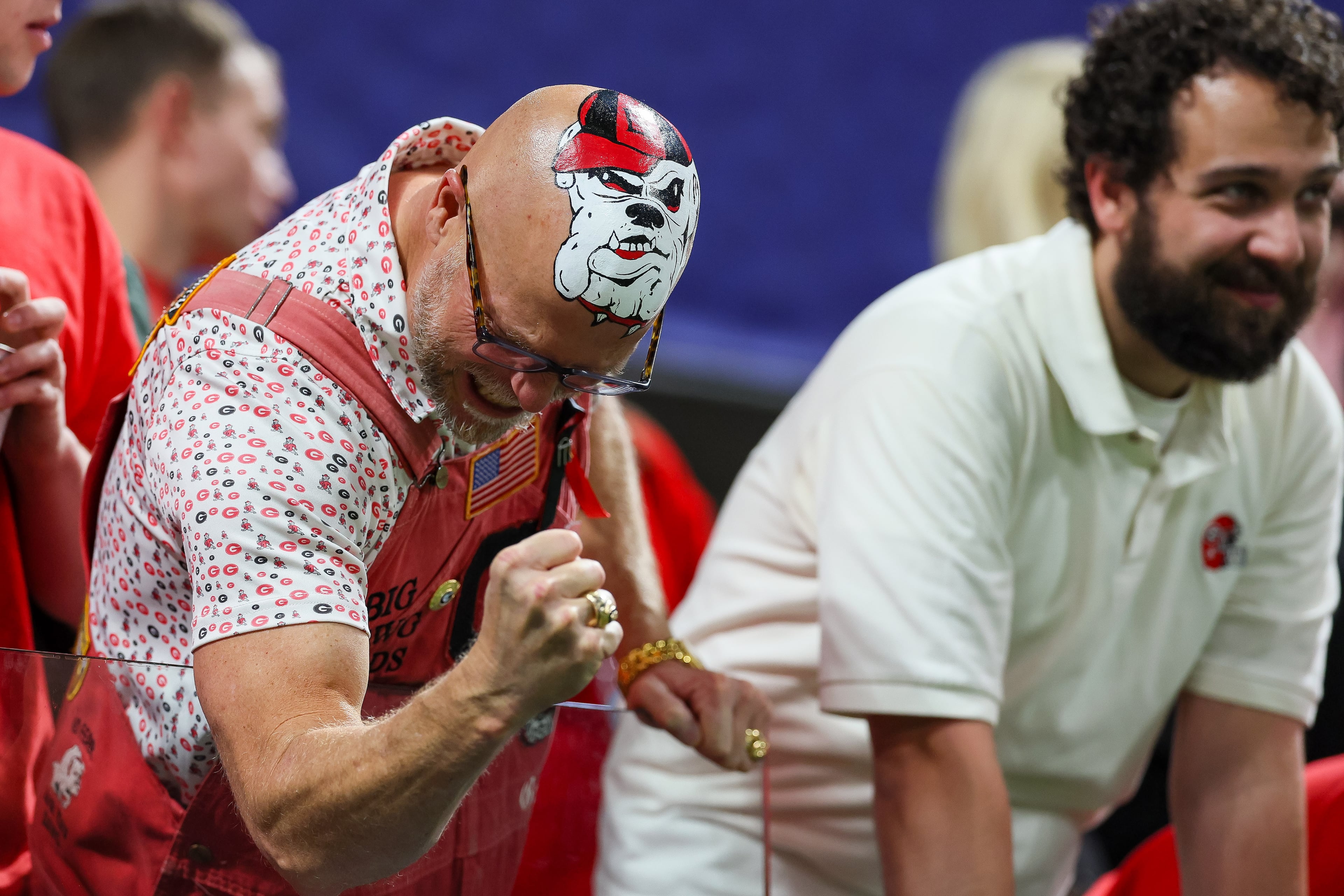 Georgia celebrates a 28-7 victory over Alabama in the SEC Championship game at Mercedes-Benz Stadium, Saturday, Dec. 6, 2025, in Atlanta. (Jason Getz / AJC)