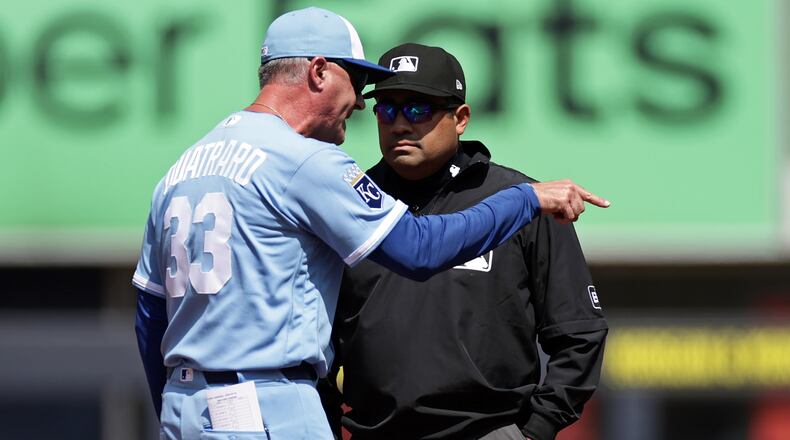 Kansas City Royals manager Matt Quatraro (33) argues with second base umpire Nestor Ceja during the first inning of a baseball game against the New York Yankees, Saturday, April 18, 2026, in New York. (AP Photo/Adam Hunger)