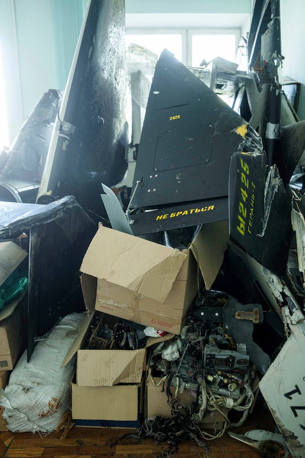 FILE - Parts of downed Shahed drones launched by Russia are piled in a storage room of a research laboratory in Kyiv, Ukraine, on Aug. 28, 2024. (AP Photo/Evgeniy Maloletka, file)