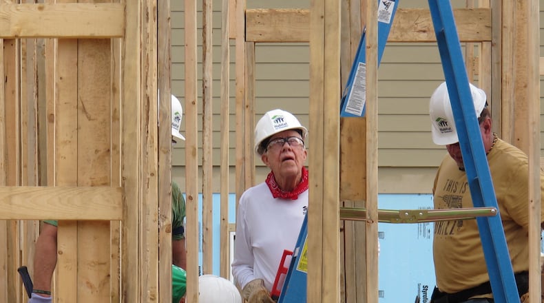Former President Jimmy Carter, center, works on a Habitat for Humanity construction project in Memphis, Tenn. (AP Photo/Adrian Sainz)